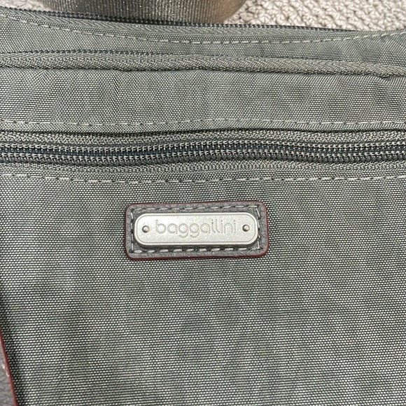 Baggallini. Brand new with tags. Grey with subtle cheetah print background. - Picture 2 of 12